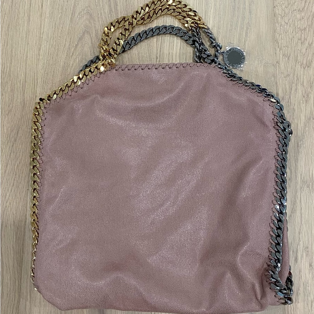 BRAND NEW STELLA MCCARTNEY PINK
FALABELLA GOLD AND SILVER HARDWARE
PRICE IS FIRM